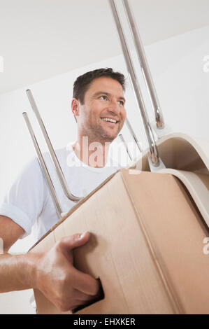 Man moved to new apartment, Bavaria, Germany Stock Photo