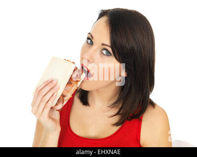 Attractive Young Woman Eating a Bacon Sandwich Stock Photo