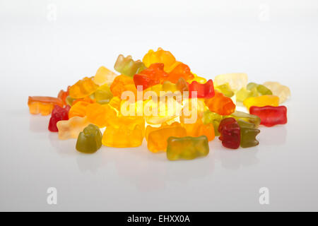 Pile of colorful gummy bears isolated over white background Stock Photo