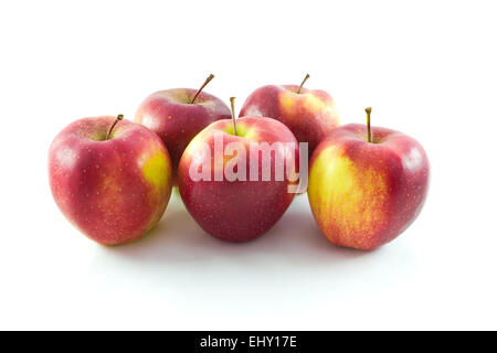 Five fresh red apples on white background. Stock Photo
