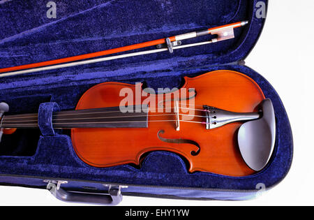 Musical instruments: violin and bow in its blue lined case closeup Stock Photo