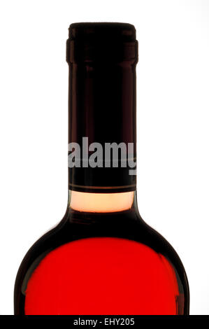 Red wine bottle closeup backlit   with black capsule