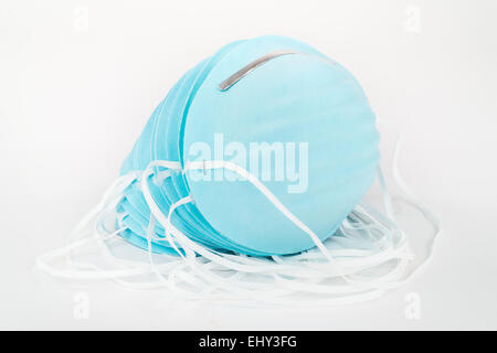 Stack of Blue, Disposable, Protective Dust Masks . Stock Photo