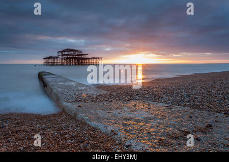 Sunset at West Pier ruins in Brighton, East Sussex, England. Stock Photo