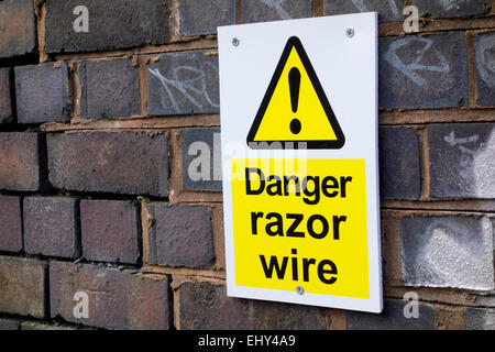 Danger Razor Wire Warning Sign, UK Stock Photo