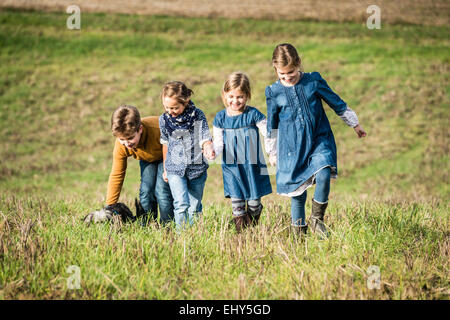 Children playing in field Stock Photo