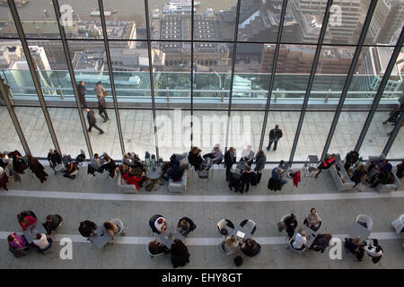 London, United Kingdom. 18th March 2015 - Visitors relaxes at the Sky Garden, at the Walkie Talkie Building in the City. Stock Photo
