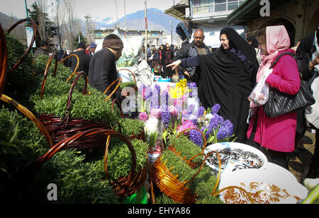 Tehran, Iran. 18th Mar, 2015. Iranians shop ahead of their 'Nowruz', the Iranian New Year, at the Tajrish bazaar in Tehran, Iran, March 18, 2015. 'Nowruz' marks the first day of spring and the beginning of the new year on the Iranian calendar. © Ahmad Halabisaz/Xinhua/Alamy Live News Stock Photo