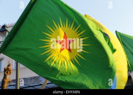 Athens, Greece. 18th Mar, 2015. A Kurdish flag from the Koma Civakên Kurdistan (Group of Communities in Kurdistan) flies at the protest in Athens. Kurdish people in Athens marched to the EU offices in Athens, protesting in support of the Kurdish people in Syria, and called for the Turkish president Erdo?an to support them against the Islamic State. © Michael Debets/Pacific Press/Alamy Live News Stock Photo