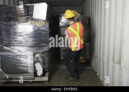 A worker who recycling thing on recycle center Stock Photo