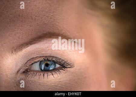 very close up eyes beautiful red-haired girl Stock Photo