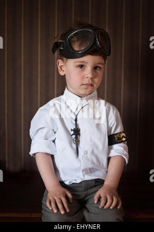 Portrait of a boy wearing steampunk accessories Stock Photo