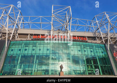 England, Manchester, city, Salford, Old Trafford Football Stadium and Statue of Sir Matt Busby Stock Photo