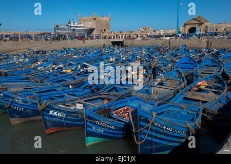 Fishing boats in the harbour at Essaouira with the Skala du Port behind, Morocco, North Africa Stock Photo