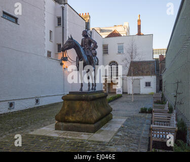 Statue of John Wesley on a horse in the courtyard of his first chapel ...