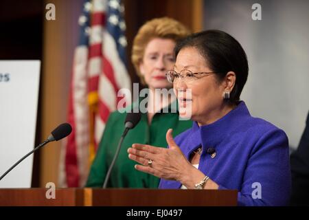 Democratic Senator Mazie Hirono speaks during a press conference on the delayed confirmation of Attorney General nominee Loretta Lynch by Senate Republicans as senator Debbie Stabenow looks on March 18, 2015 in Washington, DC. Stock Photo