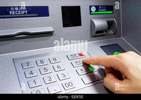 ATM - entering pin close up Stock Photo