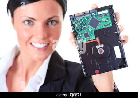 Our new software. Woman holding compact disc. Stock Photo