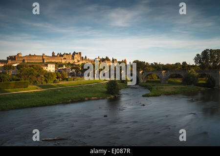 The fortified Cite de Carcassonne by the Aude River, Aude department, Languedoc-Roussillon region, France, Europe. Stock Photo