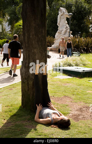 Argentina, Buenos Aires, Cabalito, Parque Centenario, Centenary Park, female jogger resting after run Stock Photo