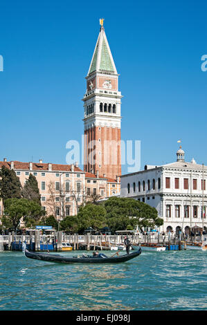 Gondola on the Grand Canal with San Marco Campanile, the bell tower. Stock Photo