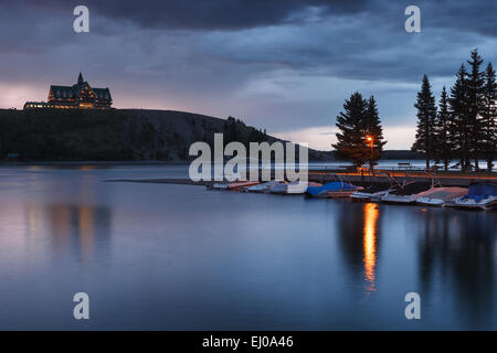 Upper Waterton Lake and the Prince of Wales Hotel, on a stormy evening. Waterton Lakes National Park, Alberta, Canada. Stock Photo