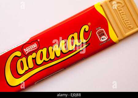 bar of Nestle Caramac chocolate set on white background - looking down on from above Stock Photo