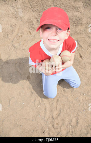 A nice child happy to play baseball Stock Photo