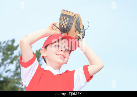 A nice child happy to play baseball Stock Photo