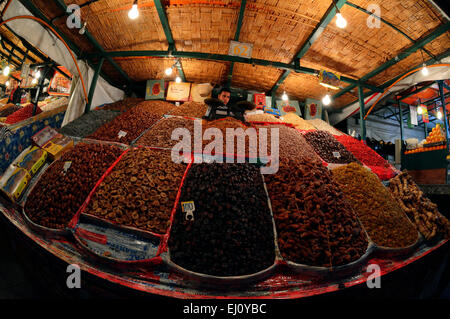Dried nuts and fruits on a stand at djemaa El-Fna market, Marrakech, Morocco. Stock Photo