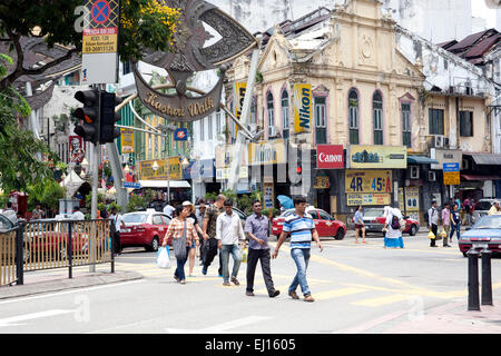 People crossing the road at traffic lights near Kasturi Walk Kuala Lumpur Malaysia Stock Photo