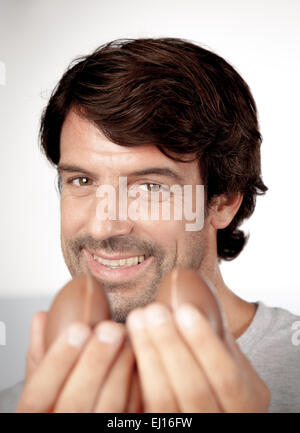 Man holding easter eggs Stock Photo