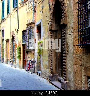 Old medieval street in Tuscany, Italy Stock Photo