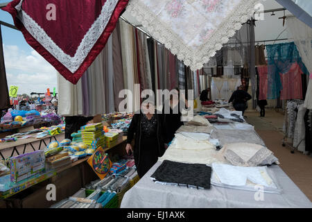 People shopping at the Bedouin market at the outskirts of Beersheba also spelled Beer-Sheva the largest city in the Negev desert of southern Israel Stock Photo