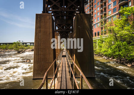 The Pipeline Walkway over the James River in Richmond, Virginia. Stock Photo