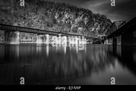 Train bridges crossing the Potomac River, in Harper's Ferry, West Virginia. Stock Photo