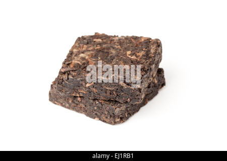 Two small briquette of black Chinese Shu Pu-erh tea isolated on white background, top view Stock Photo