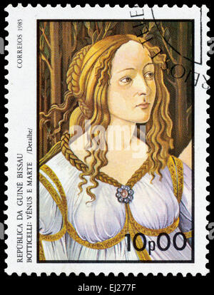 GUINEA BISSAU - CIRCA 1985: Stamp printed in Guinea-Bissau shows Venus and Mars - detail - by Botticelli, circa 1985 Stock Photo