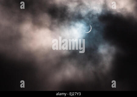 A sun eclipse made the sky have a mystic filling. Stock Photo