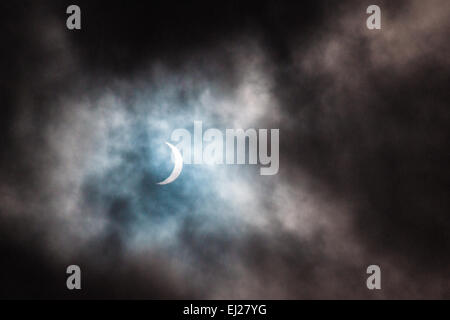 A sun eclipse made the sky have a mystic filling. Stock Photo