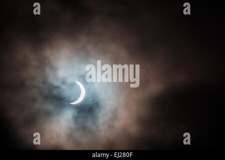 A sun eclipse made the sky have a mystic filling. Stock Photo