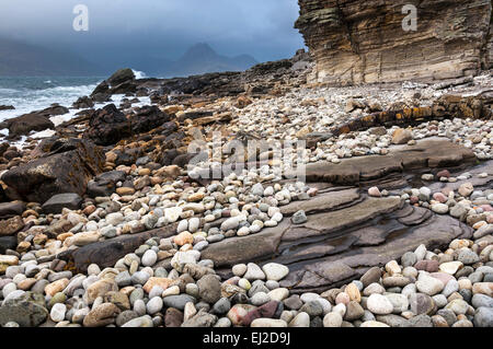 Elgol beach on the Isle of skye on a dramatic, windy day in autumn. White surf on the rocky shore. Stock Photo