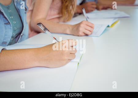 Students taking notes in class Stock Photo
