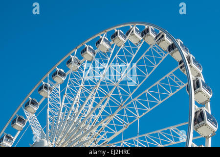 BRIGHTON, UK - JULY 28: A view of the wheel on Brighton seafront, now a popular tourist attraction. In July, 2013. Stock Photo