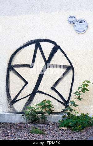 Anti-semitic graffiti on a wall in the Jewish Quarter of Kazimierz at Krakow, Poland.in September - anti-semitism antisemitism anti semitism Stock Photo