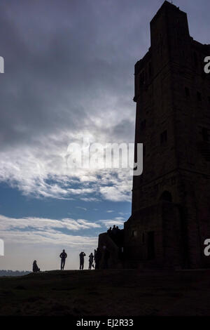 People gather on Castle Hill in Huddersfield, West Yorkshire to watch the partial solar eclipse on 20th March 2015. Stock Photo