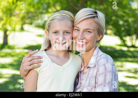 Pretty blonde with her daughter in the park Stock Photo