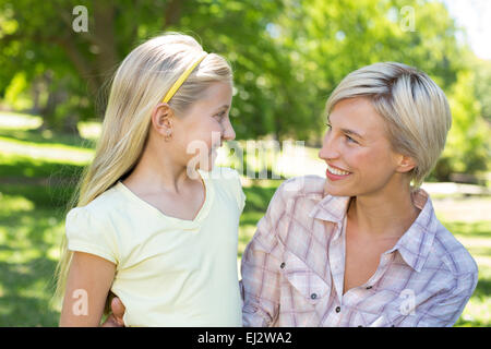 Pretty blonde with her daughter in the park Stock Photo