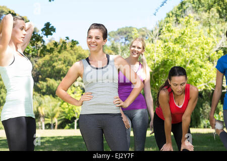 Fitness group after jogging in the park Stock Photo
