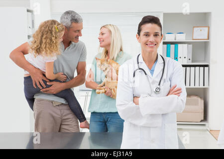 Smiling veterinarian looking at camera Stock Photo